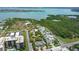 Beautiful coastal area with lush greenery, water views and modern apartment buildings at 129 Taft Dr # W102, Sarasota, FL 34236