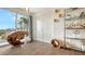 Modern foyer featuring tile floors, contemporary decor, and ocean views at 129 Taft Dr # W102, Sarasota, FL 34236