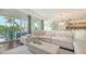 Bright living area with comfortable seating, stylish decor, and outside views at 129 Taft Dr # W102, Sarasota, FL 34236