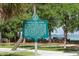 A historical marker for South Lido Park with picnic tables and waterfront views in the background at 129 Taft Dr # W102, Sarasota, FL 34236