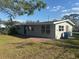 Charming single story home with neutral paint, replacement windows, and brick patio at 2020 45Th Street Ct E # A, Bradenton, FL 34208