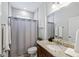 The bathroom features a shower and tub combination with a single vanity and granite countertop at 255 Annapolis Ln, Rotonda West, FL 33947