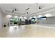 Well-equipped gym with mirrored walls, various exercise equipment, and ample open space at 3639 Santa Caterina Blvd, Lakewood Ranch, FL 34211