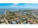 Beautiful aerial view of the neighborhood with bay access and proximity to the beach at 4101 4Th Ave, Holmes Beach, FL 34217