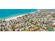 Beautiful aerial view of the home, beach and surrounding neighborhood with restaurants and shops at 4101 4Th Ave, Holmes Beach, FL 34217