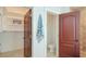 Bathroom featuring a stall shower, toilet and open closet for storage at 4101 4Th Ave, Holmes Beach, FL 34217