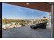 Relaxing balcony with seating area offering serene views of the surrounding landscape at 412 S Casey Key Rd, Nokomis, FL 34275