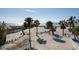 Beautiful beach front community with sandy beach, palm trees, a boardwalk, and calm waters at 412 S Casey Key Rd, Nokomis, FL 34275