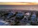 Beachfront neighborhood with a mix of coastal home styles and beach access at 412 S Casey Key Rd, Nokomis, FL 34275