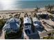 Beachfront homes with colorful turquoise ocean views and beach access at 412 S Casey Key Rd, Nokomis, FL 34275