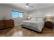 Serene bedroom with neutral tones, large windows, and elegant furnishings at 412 S Casey Key Rd, Nokomis, FL 34275
