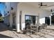 Covered outdoor seating with ceiling fans at 412 S Casey Key Rd, Nokomis, FL 34275