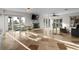 Spacious living room with a fireplace, tile floors, and stunning ocean views at 412 S Casey Key Rd, Nokomis, FL 34275