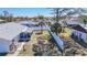 The backyard features a large white fence and mature palm trees at 4120 Shamrock Dr, Venice, FL 34293