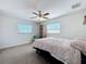 Bedroom with natural light, ceiling fan, and neutral colors at 4120 Shamrock Dr, Venice, FL 34293