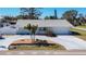Charming single-story home with well-maintained landscaping and a spacious driveway at 4120 Shamrock Dr, Venice, FL 34293