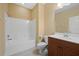 Bathroom featuring a shower-tub combo, a white toilet, and a vanity with a sink and a mirror at 4331 Turnberry Cir, North Port, FL 34288