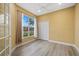 Bright bedroom with neutral walls, a ceiling fan, and light gray flooring at 4331 Turnberry Cir, North Port, FL 34288