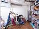 Utility basement featuring a bike, hot water heater, storage shelving, and a painted floor at 435 S Gulfstream Ave # 601, Sarasota, FL 34236