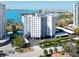 Stunning condominium building with bay views, lush landscaping, and convenient covered parking at 435 S Gulfstream Ave # 601, Sarasota, FL 34236