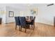 Traditional dining room featuring a wooden table with leather chairs and light wood flooring at 435 S Gulfstream Ave # 601, Sarasota, FL 34236