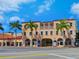 The Sarasota Opera House featuring an orange facade, and palm trees at 435 S Gulfstream Ave # 601, Sarasota, FL 34236