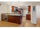 Modern kitchen with granite countertops, wood cabinets, and stainless steel appliances at 435 S Gulfstream Ave # 601, Sarasota, FL 34236