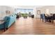 Bright and airy living room with wood floors and panoramic water views from the balcony at 435 S Gulfstream Ave # 601, Sarasota, FL 34236