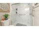 New bathroom with tile shower, glass doors, and a white marble surround, and new fixtures at 4909 Clubview E Ct, Bradenton, FL 34203