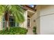 Inviting front entrance featuring a beautifully landscaped walkway and decorative accents at 4909 Clubview E Ct, Bradenton, FL 34203