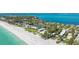 An aerial view of the complex with beachfront access at 5155 Gulf Of Mexico Dr # 9, Longboat Key, FL 34228