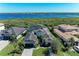 Beautiful home with mature landscaping and a paver driveway nestled within a lush community by the water at 5602 Tidewater Preserve Blvd, Bradenton, FL 34208
