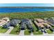 Aerial view of the single Gathering home showing a beautiful lakeside community at 5602 Tidewater Preserve Blvd, Bradenton, FL 34208