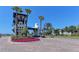 Picturesque community entryway with a water fountain, brick roads, and lush landscaping at 5602 Tidewater Preserve Blvd, Bradenton, FL 34208