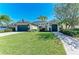 Beautiful single Gathering home with lush landscaping and two-car garage at 5602 Tidewater Preserve Blvd, Bradenton, FL 34208