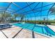 Stunning pool and hot tub featuring sparkling clear blue water and beautiful patio stone at 5602 Tidewater Preserve Blvd, Bradenton, FL 34208