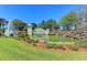 Welcome to this community! Pond with waterfall, fountain, and manicured landscaping by the entrance at 5602 Tidewater Preserve Blvd, Bradenton, FL 34208