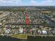 Panoramic aerial view of homes along the water, each boasting private docks in this waterfront community at 5715 Sea Trout Pl, Apollo Beach, FL 33572