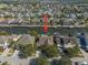 An aerial view highlights the location of the property on a waterfront canal in a residential area at 5715 Sea Trout Pl, Apollo Beach, FL 33572
