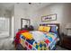 Comfortable nautical-themed bedroom showcasing decor, wood floors and natural light at 5715 Sea Trout Pl, Apollo Beach, FL 33572