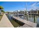 A private boat lift and dock offer direct access to the waterway, perfect for boating enthusiasts at 5715 Sea Trout Pl, Apollo Beach, FL 33572