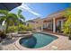Inviting backyard pool and patio area perfect for entertaining with an outdoor dining space at 5715 Sea Trout Pl, Apollo Beach, FL 33572