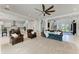 Spacious living room with comfortable seating, open floor plan, and natural light at 5822 Title Row Dr, Bradenton, FL 34210