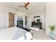 Main bedroom with a large bed, neutral colors, and plenty of natural light at 5822 Title Row Dr, Bradenton, FL 34210