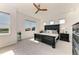 Main bedroom with a large bed, neutral colors, and plenty of natural light at 5822 Title Row Dr, Bradenton, FL 34210