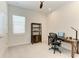 Functional office space with a desk, bookcase, and ample natural light at 5822 Title Row Dr, Bradenton, FL 34210
