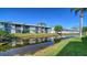 Waterfront condo complex with views of the canal and manicured landscaping at 6033 34Th W St # 35, Bradenton, FL 34210