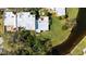 Aerial shot of condo unit showing lush yard and water view at 622 Spring Lakes Blvd, Bradenton, FL 34210
