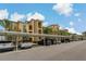 Convenient covered parking area with ample spaces available for residents and guests at 6519 Grand Estuary Trl # 101, Bradenton, FL 34212