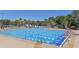 Spacious lap pool perfect for fitness, featuring lane markers and a clear blue water for a refreshing swimming experience at 6621 The Masters Ave, Lakewood Ranch, FL 34202